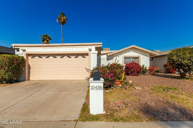 ranch-style home with a garage