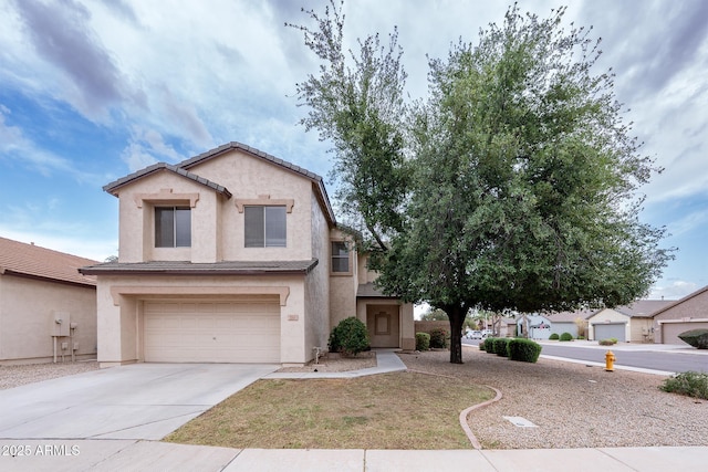 231 N Nash Way, Chandler, AZ 85225 - view of front of home featuring concrete driveway, stucco siding, a tiled roof, and a garage