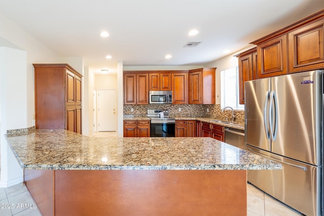 231 N Nash Way, Chandler, AZ 85225 - kitchen with light tile patterned floors, a sink, visible vents, appliances with stainless steel finishes, and decorative backsplash