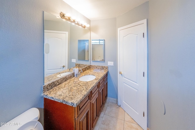 231 N Nash Way, Chandler, AZ 85225 - half bath featuring toilet, tile patterned flooring, vanity, and baseboards