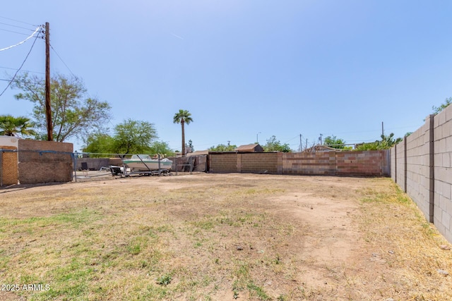 view of yard featuring fence