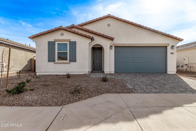 view of front of property with a garage