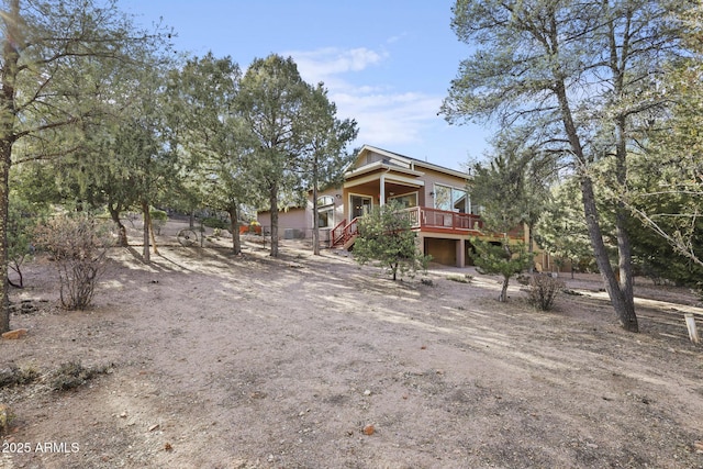 view of front of house featuring a deck