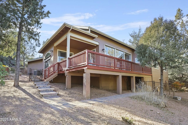 rear view of property with a deck