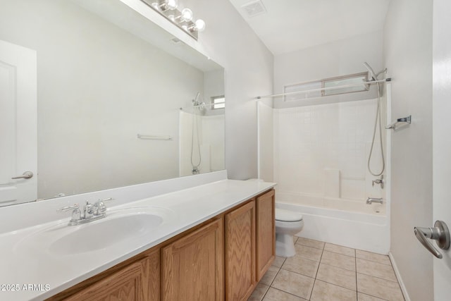 full bathroom featuring tile patterned floors, visible vents, toilet, bathtub / shower combination, and vanity