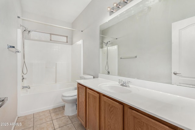 full bathroom featuring vanity, tile patterned floors, toilet, and shower / bathing tub combination