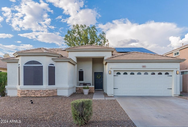 view of front of property featuring a garage