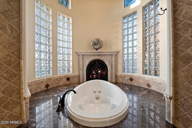 bathroom featuring tiled bath