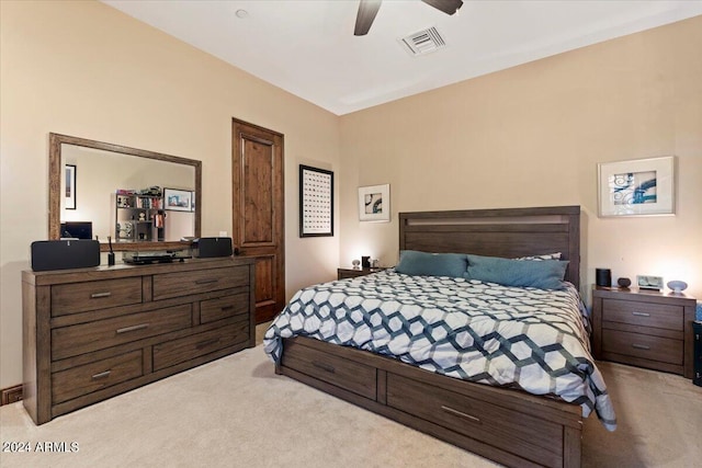 carpeted bedroom with ceiling fan