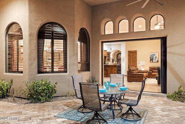 view of patio / terrace featuring ceiling fan