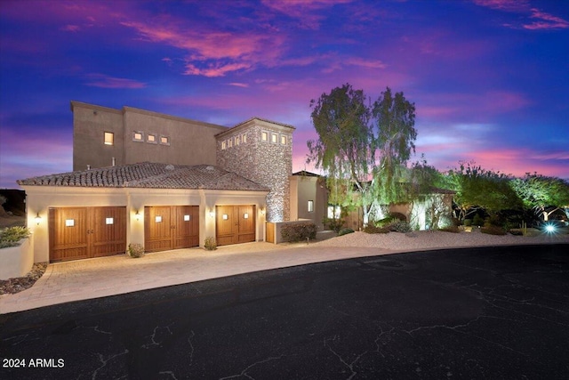 view of front of home with a garage