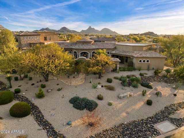 view of front of home with a mountain view