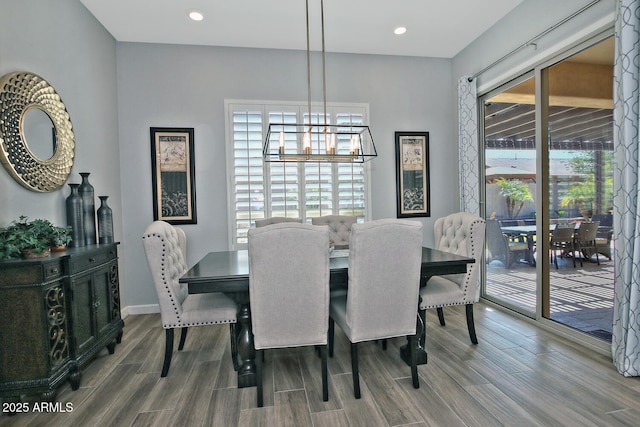895 E Clovefield St, Gilbert, AZ 85298 - dining room featuring an inviting chandelier, baseboards, wood finish floors, and recessed lighting