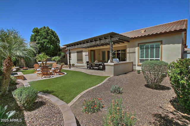 895 E Clovefield St, Gilbert, AZ 85298 - rear view of house with a patio area, stucco siding, a tile roof, and exterior kitchen