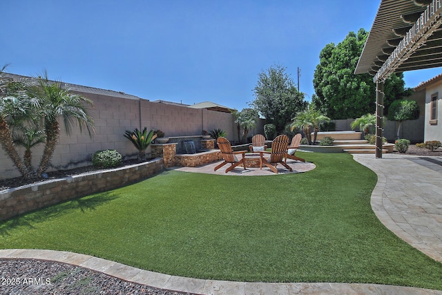 895 E Clovefield St, Gilbert, AZ 85298 - view of yard featuring a patio, a fire pit, and a fenced backyard