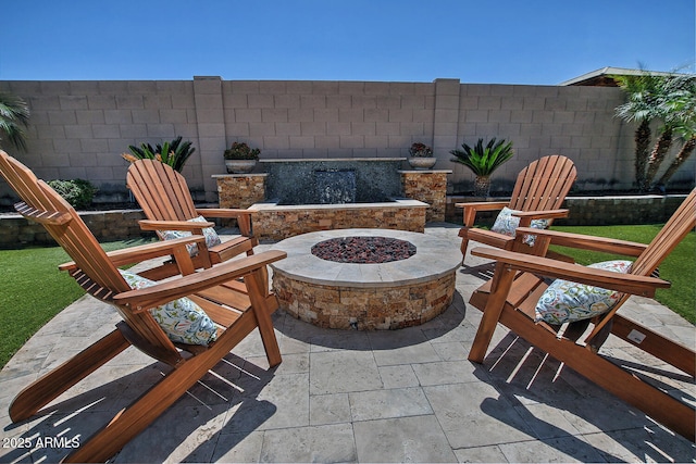 895 E Clovefield St, Gilbert, AZ 85298 - view of patio / terrace with a fire pit and a fenced backyard