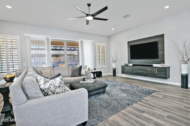 895 E Clovefield St, Gilbert, AZ 85298 - living area with baseboards, recessed lighting, a ceiling fan, visible vents, and wood finished floors