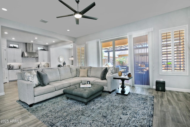 895 E Clovefield St, Gilbert, AZ 85298 - living area with baseboards, light wood-type flooring, recessed lighting, a ceiling fan, and visible vents