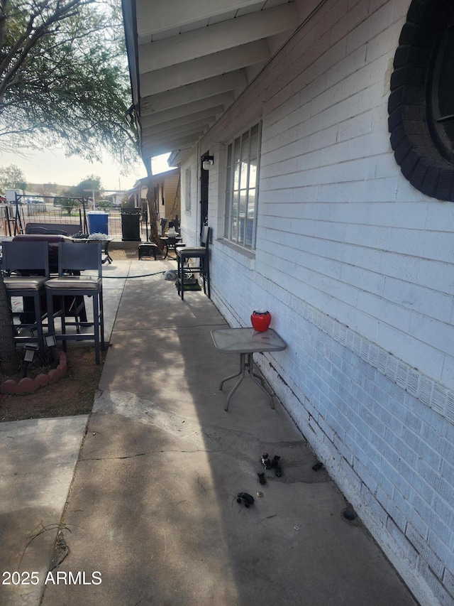 view of patio / terrace with fence