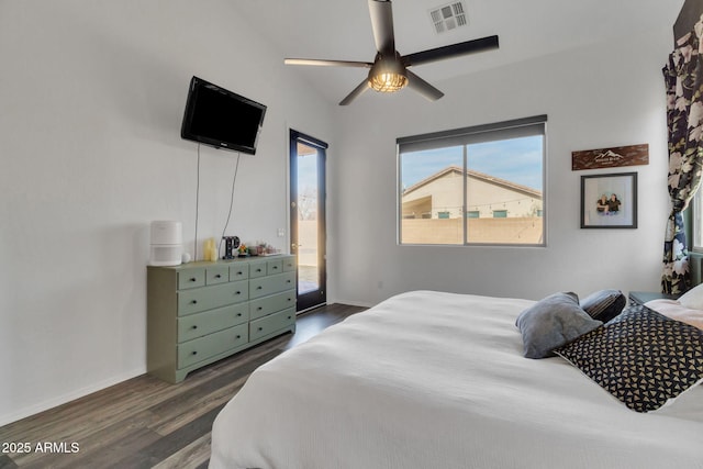 bedroom featuring dark wood-type flooring, access to outside, and ceiling fan