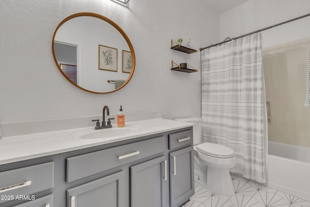 full bathroom featuring shower / bathtub combination with curtain, vanity, tile patterned flooring, and toilet