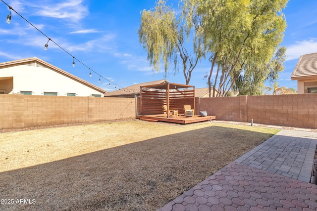 view of yard with a deck