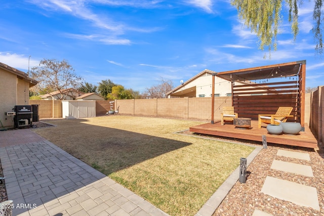 view of yard with a deck