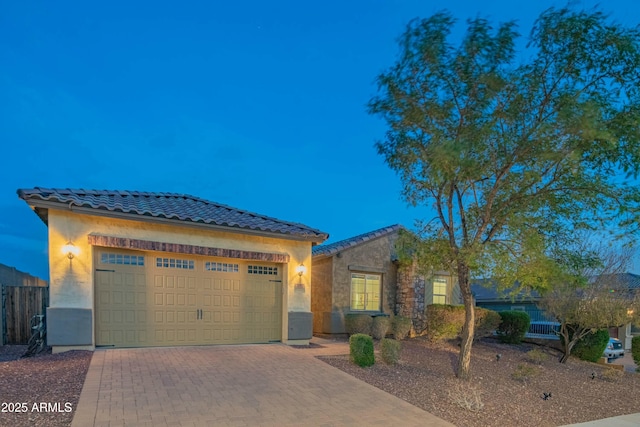 view of front of home with a garage