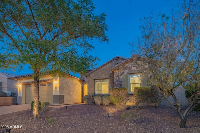 view of front of home with a garage