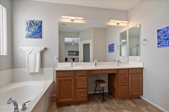 2328 W Calle Marita, Phoenix, AZ 85085 - ensuite bathroom featuring a garden tub, double vanity, and tile patterned flooring