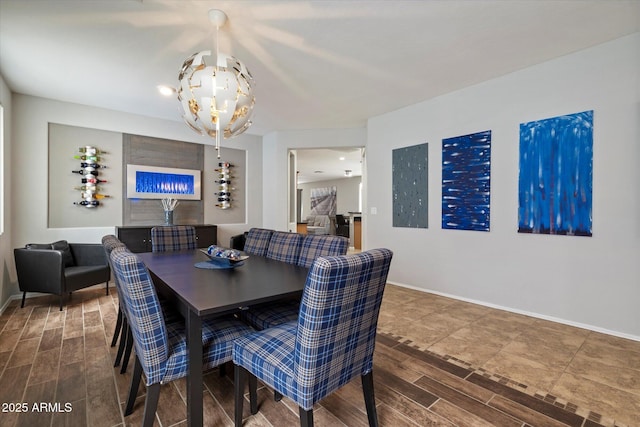 2328 W Calle Marita, Phoenix, AZ 85085 - dining area with a chandelier, wood finish floors, and baseboards