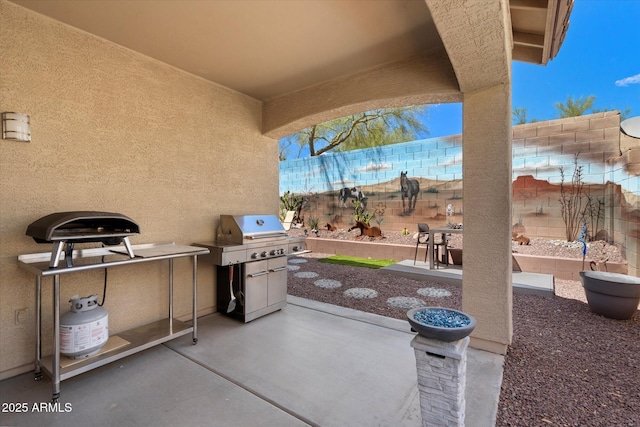 2328 W Calle Marita, Phoenix, AZ 85085 - view of patio featuring fence and area for grilling