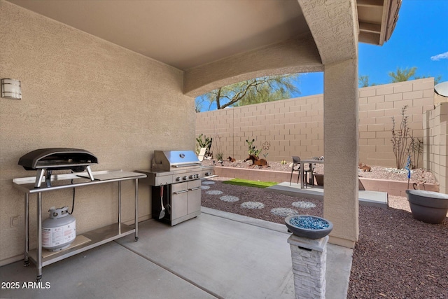 2328 W Calle Marita, Phoenix, AZ 85085 - view of patio / terrace featuring a fenced backyard and grilling area