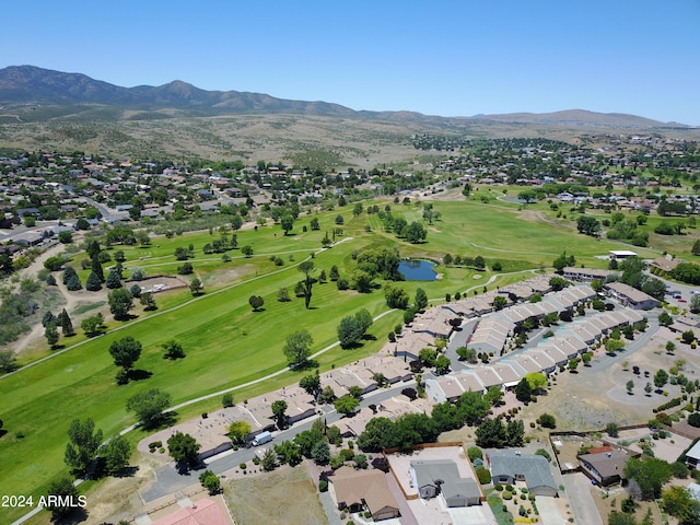 birds eye view of property featuring a water and mountain view