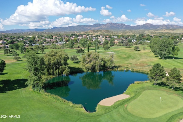 bird's eye view with a water and mountain view