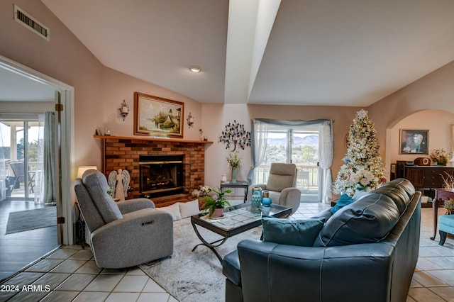 tiled living room with a fireplace