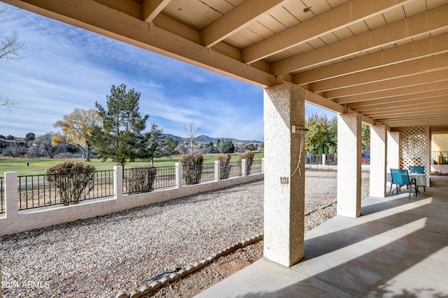 view of patio / terrace with a mountain view