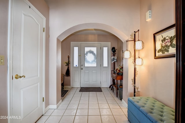 entrance foyer with light tile patterned floors