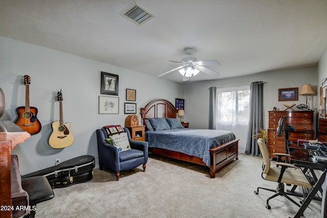 bedroom featuring ceiling fan and light colored carpet