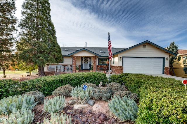 ranch-style home with a garage