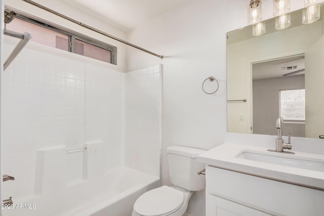 bathroom with vanity, bathing tub / shower combination, toilet, and visible vents