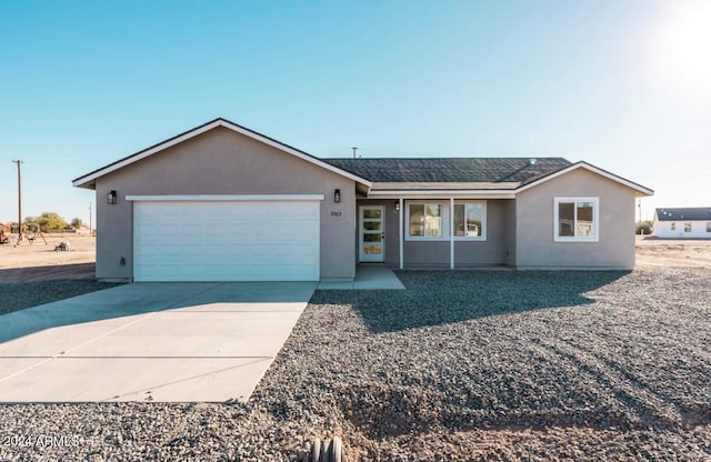 ranch-style house with a garage