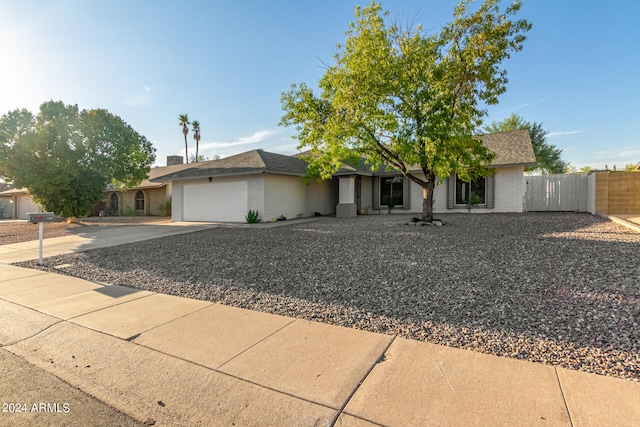 ranch-style home with a garage