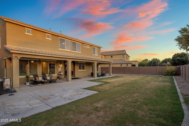 7616 S Sorrell Ln, Gilbert, AZ 85298 - back of house with stucco siding, a fenced backyard, and a patio area