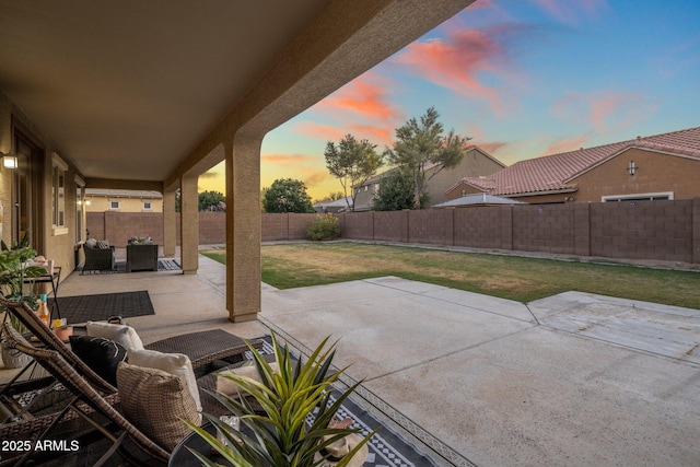 7616 S Sorrell Ln, Gilbert, AZ 85298 - patio terrace at dusk with an outdoor living space, a fenced backyard, and a patio