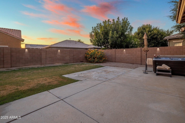 7616 S Sorrell Ln, Gilbert, AZ 85298 - fenced backyard featuring a hot tub and a patio area
