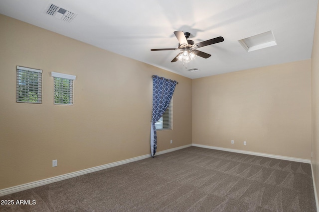 7616 S Sorrell Ln, Gilbert, AZ 85298 - spare room featuring dark carpet, attic access, and a ceiling fan