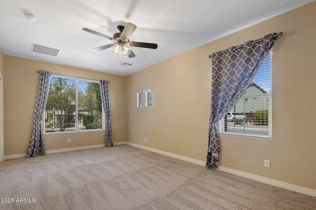 7616 S Sorrell Ln, Gilbert, AZ 85298 - carpeted spare room with a ceiling fan and a smoke detector