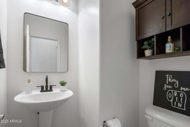 7616 S Sorrell Ln, Gilbert, AZ 85298 - bathroom featuring toilet and a sink