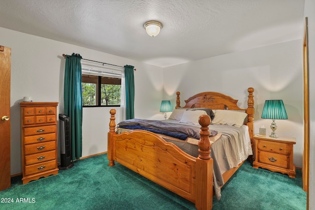 carpeted bedroom with a textured ceiling